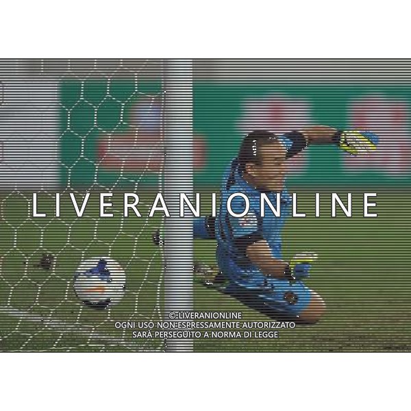 (140318) -- GUANGZHOU, March 18, 2014 () -- Choi Eun Sung of Jeonbuk Hyundai Motors of South Korea saves the ball during the group G match of 2014 AFC Champions League against Guangzhou Evergrade of China in Guangzhou, capital of south China\'s Guangdong Province, March 18, 2014. Jeonbuk Hyundai Motors lost 1-3. (/Liu Dawei) AG ALDO LIVERANI SAS ONLY ITALY