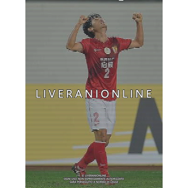 (140318) -- GUANGZHOU, March 18, 2014 () -- Liao Lisheng of Guangzhou Evergrande of China, celebrates after scoring during the group G match of 2014 AFC Champions League against Jeonbuk Hyundai Motors of South Korea in Guangzhou, capital of south China\'s Guangdong Province, March 18, 2014. Guangzhou Evergrande won 3-1. (/Liu Dawei) AG ALDO LIVERANI SAS ONLY ITALY