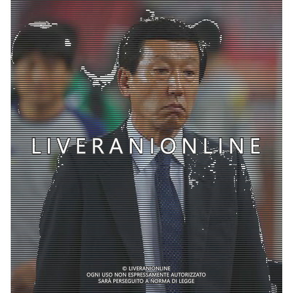 (140318) -- GUANGZHOU, March 18, 2014 () -- Choi Kang-hee, head coach of Jeonbuk Hyundai Motors of South Korea, reacts during the group G match of 2014 AFC Champions League against Guangzhou Evergrande of China in Guangzhou, capital of south China\'s Guangdong province, March 18, 2014. Jeonbuk Hyundai Motors lost 1-3. () AG ALDO LIVERANI SAS ONLY ITALY