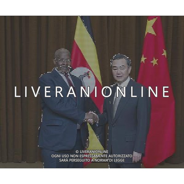 (140318) -- BEIJING, March 18, 2014 () -- Chinese Foreign Minister Wang Yi (R) holds talks with his Ugandan counterpart Sam Kutesa in Beijing, capital of China, March. 18, 2014. (/Wang Ye) (zc) AG ALDO LIVERANI SAS ONLY ITALY