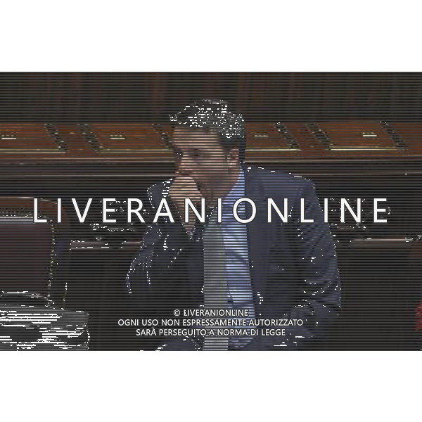 Roma - 19/03/2014 - Montecitorio - Il premier Matteo Renzii illustra alla Camera la sua \'road map\' da portare al Consiglio europeo di domani - nella foto: Matteo Renzi sbadiglia durante gli interventi in aula /Ph. Fabrizio Corradetti - Ag. Aldo Liverani sas