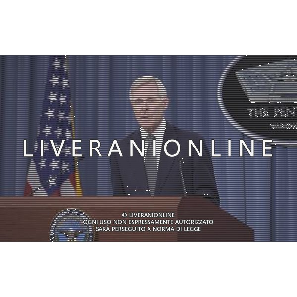 (140318) -- WASHINGTON, March 18, 2014 () -- U.S. Navy Secretary Ray Mabus makes brief remarks concerning security improvement plans and reviews on the Washington Navy Yard shooting last September at Pentagon in Washington D.C., capital of the United States, March 18, 2014. U.S. Defense Secretary Chuck Hagel and U.S. Navy Secretary Ray Mabus detailed steps to implement security changes following the Navy Yard shooting that left 12 people dead and several others wounded. (/Bao Dandan) AG ALDO LIVERANI SAS ONLY ITALY