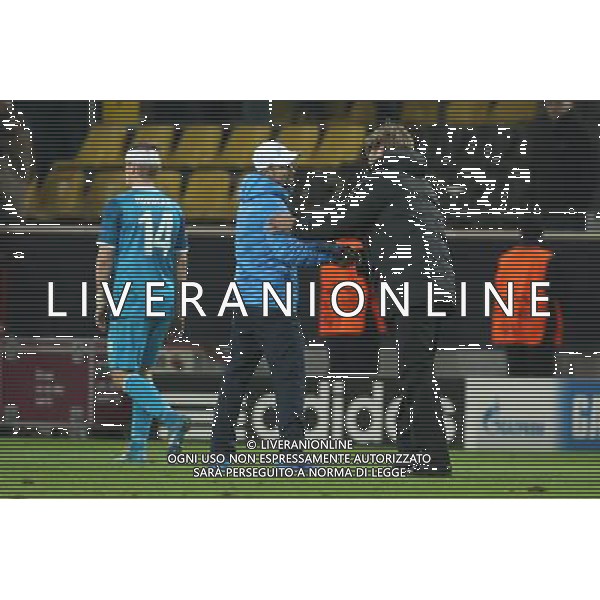 19.03.2014, Signal Iduna Park, Dortmund, GER, UEFA CL, Borussia Dortmund vs Zenit St. Petersburg, Achtelfinale, Rueckspiel, im Bild Trainer Juergen Klopp (Borussia Dortmund) mit Trainer, Coach Sergey Semak (Zenit St Petersburg) nach dem Abpfiff // during the UEFA Champions League Round of 16, 2nd Leg match between Borussia Dortmund and Zenit St. Petersburg at the Signal Iduna Park in Dortmund, Germany on 2014/03/19. EXPA Pictures © 2014, PhotoCredit: EXPA/ Eibner-Pressefoto/ Schueler *****ATTENTION - OUT of GER***** ©photoshot/AGENZIA ALDO LIVERANI SAS - ITALY ONLY - Borussia Dortmund vs Zenit San Pietroburgo UEFA Champions League Ottavi di 16, Germania 19 marzo 2014