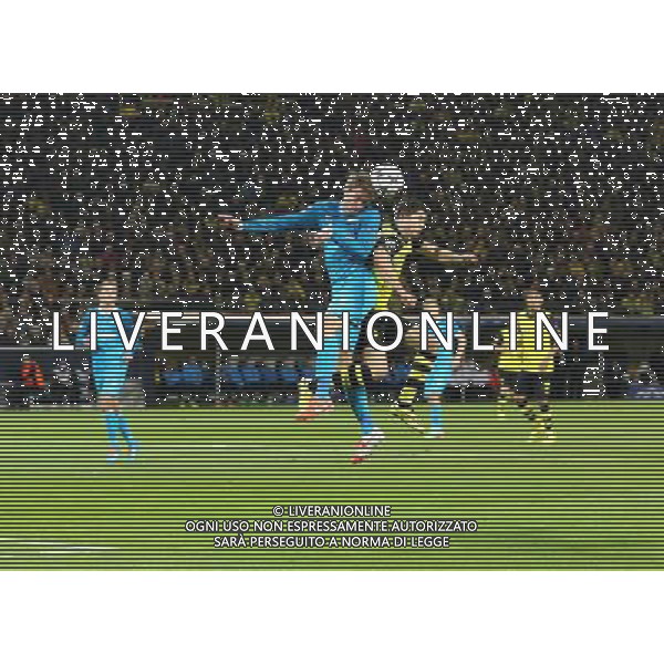 19.03.2014, Signal Iduna Park, Dortmund, GER, UEFA CL, Borussia Dortmund vs Zenit St. Petersburg, Achtelfinale, Rueckspiel, im Bild Robert Lewandowski (Borussia Dortmund #9) im Kopfballduell gegen Nicolas Lombaerts (Zenit St Petersburg #6) // during the UEFA Champions League Round of 16, 2nd Leg match between Borussia Dortmund and Zenit St. Petersburg at the Signal Iduna Park in Dortmund, Germany on 2014/03/19. EXPA Pictures © 2014, PhotoCredit: EXPA/ Eibner-Pressefoto/ Schueler *****ATTENTION - OUT of GER***** ©photoshot/AGENZIA ALDO LIVERANI SAS - ITALY ONLY - Borussia Dortmund vs Zenit San Pietroburgo UEFA Champions League Ottavi di 16, Germania 19 marzo 2014