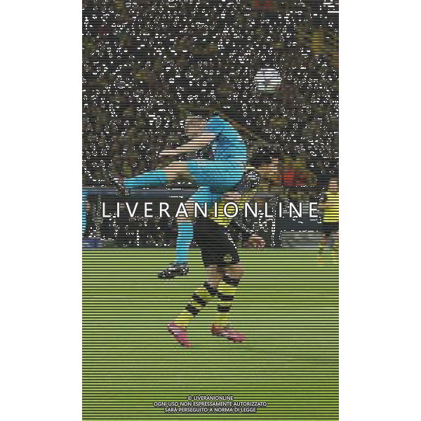 19.03.2014, Signal Iduna Park, Dortmund, GER, UEFA CL, Borussia Dortmund vs Zenit St. Petersburg, Achtelfinale, Rueckspiel, im Bild Aleksandr Anyukov (Zenit St Petersburg #22) im Kopfballduell gegen Mats Hummels (Borussia Dortmund #15) // during the UEFA Champions League Round of 16, 2nd Leg match between Borussia Dortmund and Zenit St. Petersburg at the Signal Iduna Park in Dortmund, Germany on 2014/03/19. EXPA Pictures © 2014, PhotoCredit: EXPA/ Eibner-Pressefoto/ Schueler *****ATTENTION - OUT of GER***** ©photoshot/AGENZIA ALDO LIVERANI SAS - ITALY ONLY - Borussia Dortmund vs Zenit San Pietroburgo UEFA Champions League Ottavi di 16, Germania 19 marzo 2014