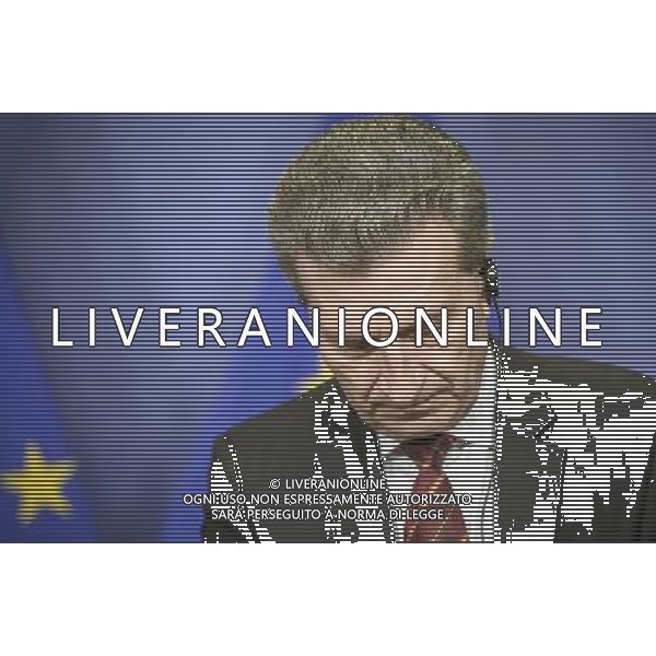 European Commissioner for Energy, German Guenther Oettinger gives a press briefing after a meeting at the EU headquarters in Brussels, Belgium on 19.03.2014 The European Union moves closer to providing Ukraine with 1.6 billion euros (2.2 billion dollars) in loans, once Kiev concludes an agreement with the International Monetary Fund (IMF). The European Commission, the bloc\'s executive, agreed to top up a previously-agreed loan to Kiev with an extra 1 billion euros - a move it had proposed as part of an aid package totalling 11 billion euros. by Wiktor Dabkowski ©photoshot/AGENZIA ALDO LIVERANI SAS - ITALY ONLY - L\'Unione europea discute per fornire all\'Ucraina un prestito, dal Fondo monetario internazionale (FMI) come parte di un pacchetto di aiuti a Kiev a Bruxelles, Belgio 19 marzo 2014