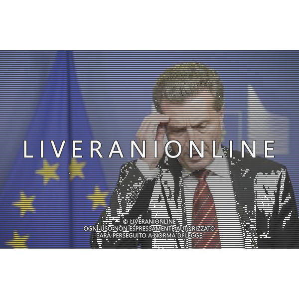 European Commissioner for Energy, German Guenther Oettinger gives a press briefing after a meeting at the EU headquarters in Brussels, Belgium on 19.03.2014 The European Union moves closer to providing Ukraine with 1.6 billion euros (2.2 billion dollars) in loans, once Kiev concludes an agreement with the International Monetary Fund (IMF). The European Commission, the bloc\'s executive, agreed to top up a previously-agreed loan to Kiev with an extra 1 billion euros - a move it had proposed as part of an aid package totalling 11 billion euros. by Wiktor Dabkowski ©photoshot/AGENZIA ALDO LIVERANI SAS - ITALY ONLY - L\'Unione europea discute per fornire all\'Ucraina un prestito, dal Fondo monetario internazionale (FMI) come parte di un pacchetto di aiuti a Kiev a Bruxelles, Belgio 19 marzo 2014