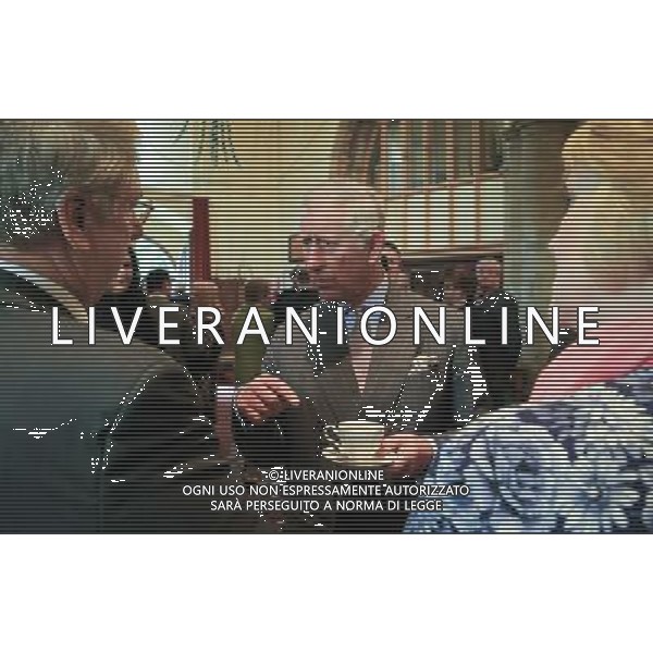 The Prince of Wales speaks with local residents and business owners affected by the recent floods, during a visit to St. Peter\'s and St. Paul\'s Church in Yalding, Kent. AG ALDO LIVERANI SAS ONLY ITALY