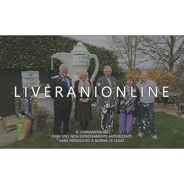The Prince of Wales and the Duchess of Cornwall pose for a picture with Keith Blazye (left) his wife Sue and son Luke (right) who own Teapot Island in Yalding, Kent, during a visit to the village to meet with local residents and business owners who were affected by the recent floods. AG ALDO LIVERANI SAS ONLY ITALY