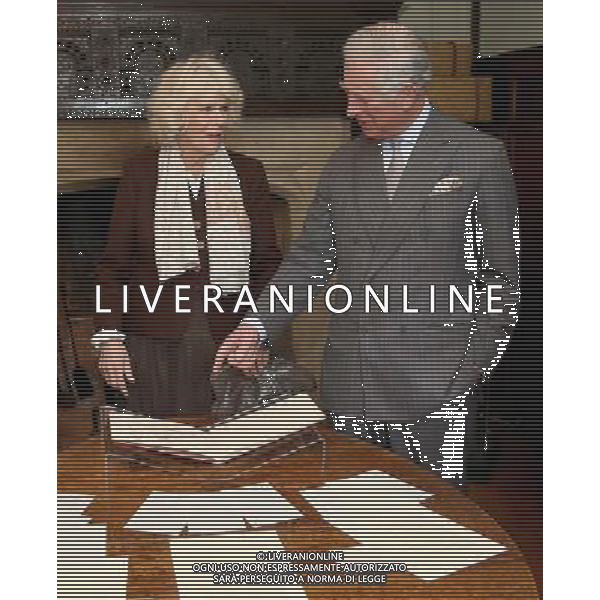 BURWASH, UNITED KINGDOM - MARCH 19: Prince Charles, Prince of Wales and Camilla, Duchess of Cornwall look at manuscripts as they visit Bateman\'s, the East Sussex home who wrote the author, on March 19, 2014 in Burwash, United Kingdom. Bateman\'s was the secluded family home who wrote the author who wrote the \'Jungle Book\' and \'If\'. AG ALDO LIVERANI SAS ONLY ITALY