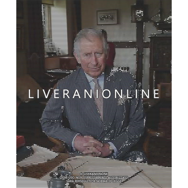 BURWASH, UNITED KINGDOM - MARCH 19: Prince Charles, Prince of Wales sits at Rudyard Kipling\'s desk as he visits Bateman\'s, the East Sussex home who wrote the author, on March 19, 2014 in Burwash, United Kingdom. Bateman\'s was the secluded family home who wrote the author who wrote the \'Jungle Book\' and \'If\'. AG ALDO LIVERANI SAS ONLY ITALY