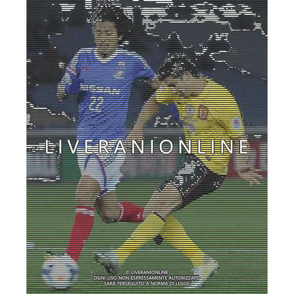 (140312) -- YOKOHAMA, March 12, 2014 () -- Elikeson (R) of Guangzhou Evergrande competes for the ball during the AFC Champions League match againt Yokohama F Marinos in Yokohama, Japan, March 12, 2014. (/Stringer) ©photohsot/AGENZIA ALDO LIVERANI SAS - ITALY ONLY - Guangzhou Evergrande Vs Yokohama F Marinos partita AFC Champions League a Yokohama, Giappone, 12 marzo, 2014.