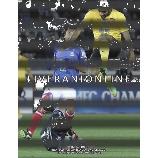 (140312) -- YOKOHAMA, March 12, 2014 () -- Muriqui (R) of Guangzhou Evergrande jumps over the goalkeeper of Yokohama F Marinos during the AFC Champions League match in Yokohama, Japan, March 12, 2014. (/Stringer) ©photohsot/AGENZIA ALDO LIVERANI SAS - ITALY ONLY - Guangzhou Evergrande Vs Yokohama F Marinos partita AFC Champions League a Yokohama, Giappone, 12 marzo, 2014.