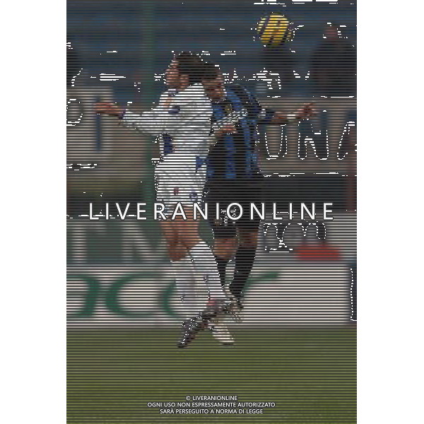Inter - Bologna Coppa Italia Tim cup 21/11/2004 nella foto: mourad meghni e coco francesco foto marco luzzani/agenzia aldo liverani