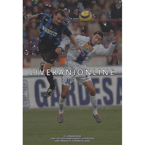 Inter - Bologna Coppa Italia Tim cup 21/11/2004 nella foto: mourad meghni e zanetti cristiano foto marco luzzani/agenzia aldo liverani