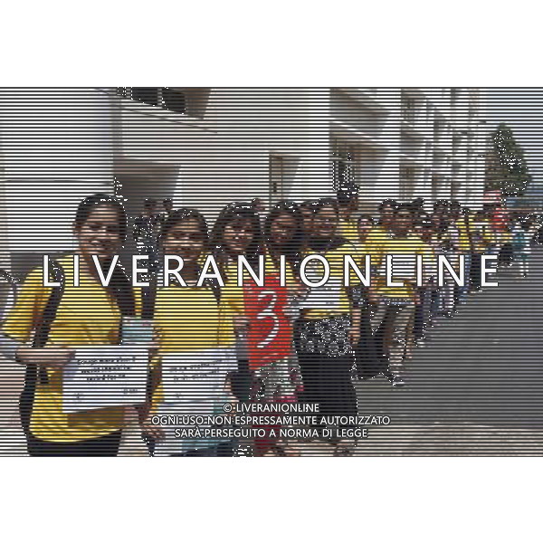 (140324) -- NEW DELHI, March 24, 2014 () -- Interns and doctors of All India Institute of Medical Sciences (AIIMS) display placards during an awareness program on the \'World Tuberculosis Day\' at the AIIMS campus in New Delhi, India, March 24, 2014. World Tuberculosis Day is designated to raise the common public awareness about the global epidemic disease of tuberculosis. (/Partha Sarkar)(zhf) AG ALDO LIVERANI SAS ONLY ITALY