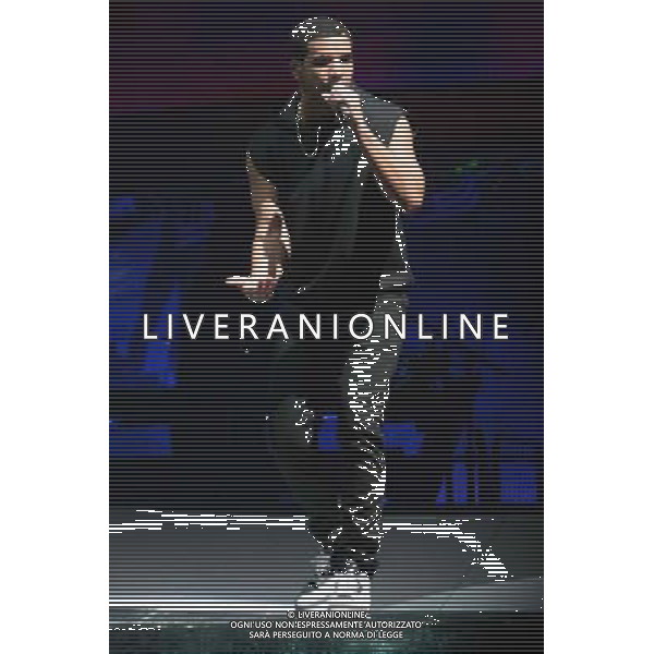 Canadian rapper, songwriter Drake (aka Aubrey Drake Graham) performs his first London show at the O2 Arena, London, England, UK on Friday 24th March 2014. AG ALDO LIVERANI SAS ONLY ITALY
