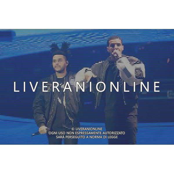 Canadian singer The Weeknd (born Abel Tesfaye) duets with Canadian rapper, songwriter Drake (aka Aubrey Drake Graham) at his first London show at the O2 Arena, London, England, UK on Friday 24th March 2014. AG ALDO LIVERANI SAS ONLY ITALY