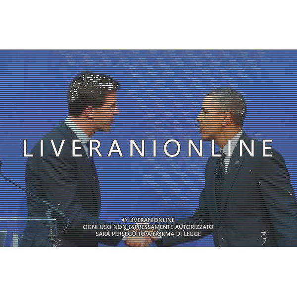 (140325) -- THE HAGUE, March 25, 2014 () -- Dutch Prime Minister Mark Rutte (L) shakes hands with U.S. President Barack Obama during the closing press conference of the Nuclear Security Summit (NSS) 2014 in The Hague, the Netherlands, on March 25, 2014. The Nuclear Security Summit (NSS) 2014 concluded in The Hague on Tuesday with a communique reached by world leaders to prevent nuclear material from falling into the hands of terrorists. (/Gong Bing) AG ALDO LIVERANI SAS ONLY ITALY