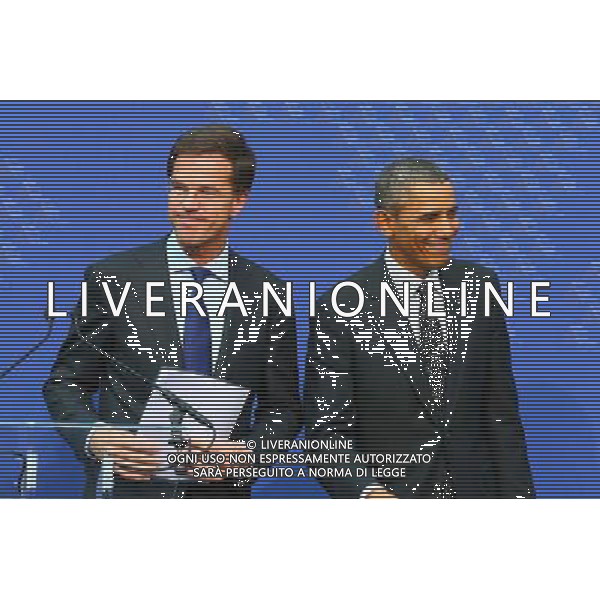 (140325) -- THE HAGUE, March 25, 2014 () -- Dutch Prime Minister Mark Rutte (L) and U.S. President Barack Obama attend the closing press conference of the Nuclear Security Summit (NSS) 2014 in The Hague, the Netherlands, on March 25, 2014. The Nuclear Security Summit (NSS) 2014 concluded in The Hague on Tuesday with a communique reached by world leaders to prevent nuclear material from falling into the hands of terrorists. (/Gong Bing) AG ALDO LIVERANI SAS ONLY ITALY