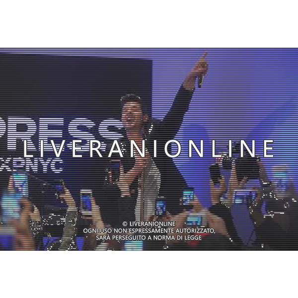 Singer Robin Thicke performs during the grand opening of EXPRESS Times Square on March 25, 2014 in New York City. AG ALDO LIVERANI SAS ONLY ITALY