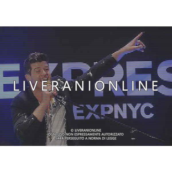Singer Robin Thicke performs during the grand opening of EXPRESS Times Square on March 25, 2014 in New York City. AG ALDO LIVERANI SAS ONLY ITALY