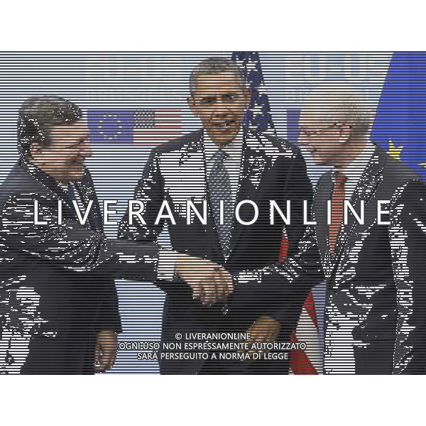 US President Barack Obama (C) is welcomed by EU Council President Herman Van Rompuy (R) and EU Commission President Jose Manuel Barroso (L) at the European Council headquarters in Brussels, Belgium on 26.03.2014 Obama is in Brussels for a EU-US summit. The US leader is on a week-long trip to Europe and Saudi Arabia, which has already included two days of international talks in the Netherlands. by Wiktor Dabkowski AG ALDO LIVERANI SAS ONLY ITALY