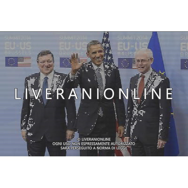 US President Barack Obama (C) is welcomed by EU Council President Herman Van Rompuy (R) and EU Commission President Jose Manuel Barroso (L) at the European Council headquarters in Brussels, Belgium on 26.03.2014 Obama is in Brussels for a EU-US summit. The US leader is on a week-long trip to Europe and Saudi Arabia, which has already included two days of international talks in the Netherlands. by Wiktor Dabkowski AG ALDO LIVERANI SAS ONLY ITALY