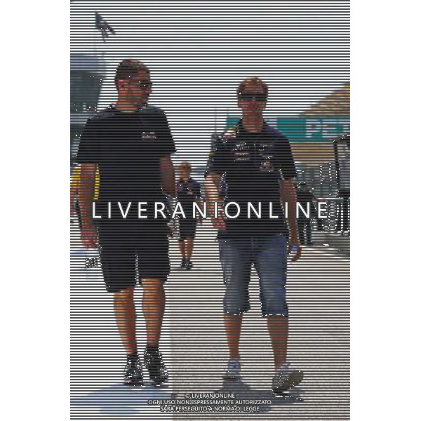 Sebastian Vettel (GER) Red Bull Racing walks the circuit with Guillaume Rocquelin (ITA) Red Bull Racing Race Engineer. 27.03.2014. Formula 1 World Championship, Rd 2, Malaysian Grand Prix, Sepang, Malaysia, Thursday. - www.xpbimages.com, EMail: requests@xpbimages.com - copy of publication required for printed pictures. Every used picture is fee-liable. © Copyright: Batchelor / XPB Images AG ALDO LIVERANI SAS ONLY ITALY