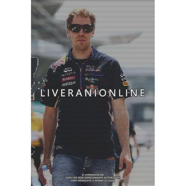 Sebastian Vettel (GER) Red Bull Racing walks the circuit. 27.03.2014. Formula 1 World Championship, Rd 2, Malaysian Grand Prix, Sepang, Malaysia, Thursday. - www.xpbimages.com, EMail: requests@xpbimages.com - copy of publication required for printed pictures. Every used picture is fee-liable. © Copyright: Batchelor / XPB Images AG ALDO LIVERANI SAS ONLY ITALY