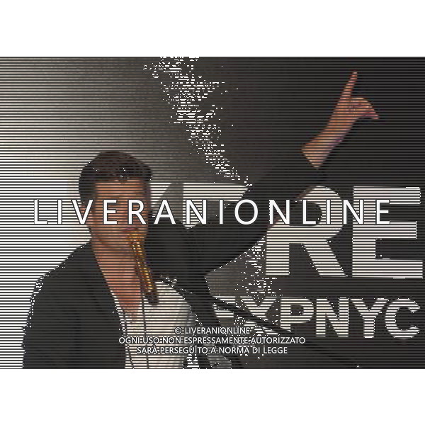Singer Robin Thicke performs during the grand opening of EXPRESS Times Square on March 25, 2014 in New York City. ©photohsot/AGENZIA ALDO LIVERANI SAS - ITALY ONLY - EDITORIAL USE ONLY