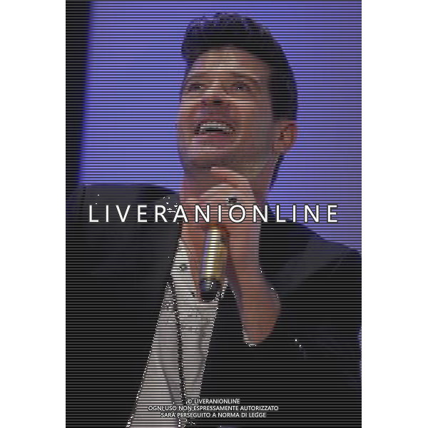 Singer Robin Thicke performs during the grand opening of EXPRESS Times Square on March 25, 2014 in New York City. ©photohsot/AGENZIA ALDO LIVERANI SAS - ITALY ONLY - EDITORIAL USE ONLY