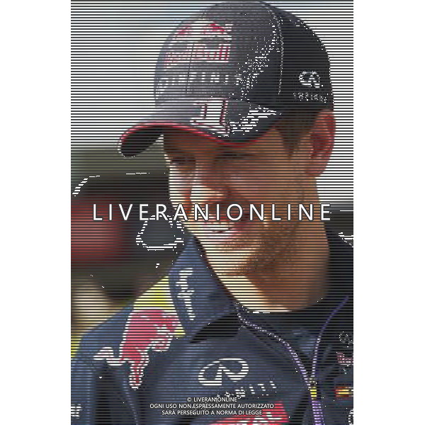 Sebastian Vettel (GER) Red Bull Racing. 27.03.2014. Formula 1 World Championship, Rd 2, Malaysian Grand Prix, Sepang, Malaysia, Thursday. - www.xpbimages.com, EMail: requests@xpbimages.com - copy of publication required for printed pictures. Every used picture is fee-liable. © Copyright: Batchelor / XPB Images AG ALDO LIVERANI SAS ONLY ITALY