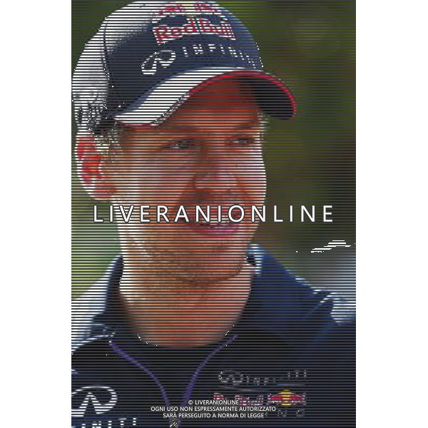 Sebastian Vettel (GER) Red Bull Racing. 27.03.2014. Formula 1 World Championship, Rd 2, Malaysian Grand Prix, Sepang, Malaysia, Thursday. - www.xpbimages.com, EMail: requests@xpbimages.com - copy of publication required for printed pictures. Every used picture is fee-liable. © Copyright: Batchelor / XPB Images AG ALDO LIVERANI SAS ONLY ITALY