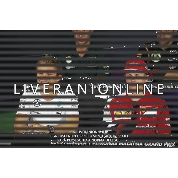 (L to R): Nico Rosberg (GER) Mercedes AMG F1 and Kimi Raikkonen (FIN) Ferrari in the FIA Press Conference. 27.03.2014. Formula 1 World Championship, Rd 2, Malaysian Grand Prix, Sepang, Malaysia, Thursday. - www.xpbimages.com, EMail: requests@xpbimages.com - copy of publication required for printed pictures. Every used picture is fee-liable. © Copyright: Photo4 / XPB Images AG ALDO LIVERANI SAS ONLY ITALY