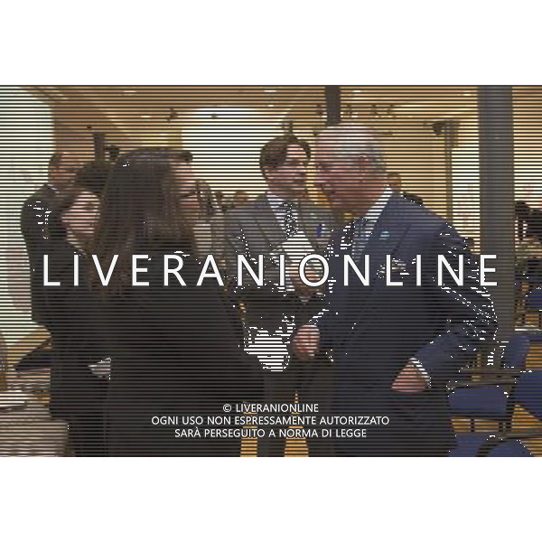  Date: 26/03/14 Pictured: The Prince of Wales with Yolande Barnes Caption: The Prince of Wales, President of the Prince\'s Foundation for Building Community, attended the Housing London Symposium which took place at the Prince\'s Foundation for Building Community in East London today. ©PHOTOSHOT/AGENZIA ALDO LIVERANI SAS - ITALY ONLY - REALI INGLESI: IL PRINCIPE CARLO D\'INGHILTERRA PARTECIPA AL SIMPOSIO HOUSING LONDRA