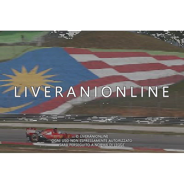 Fernando Alonso (ESP), Scuderia Ferrari 28.03.2014. Formula 1 World Championship, Rd 2, Malaysian Grand Prix, Sepang, Malaysia, Friday. - www.xpbimages.com, EMail: requests@xpbimages.com - copy of publication required for printed pictures. Every used picture is fee-liable. © Copyright: Charniaux / XPB Images AG ALDO LIVERANI SAS ONLY ITALY