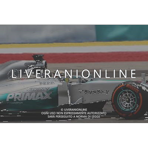 Lewis Hamilton (GBR) Mercedes AMG F1 W05. 28.03.2014. Formula 1 World Championship, Rd 2, Malaysian Grand Prix, Sepang, Malaysia, Friday. - www.xpbimages.com, EMail: requests@xpbimages.com - copy of publication required for printed pictures. Every used picture is fee-liable. © Copyright: Photo4 / XPB Images AG ALDO LIVERANI SAS ONLY ITALY