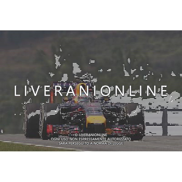 Sebastian Vettel (GER) Red Bull Racing RB10. 28.03.2014. Formula 1 World Championship, Rd 2, Malaysian Grand Prix, Sepang, Malaysia, Friday. - www.xpbimages.com, EMail: requests@xpbimages.com - copy of publication required for printed pictures. Every used picture is fee-liable. © Copyright: Photo4 / XPB Images AG ALDO LIVERANI SAS ONLY ITALY