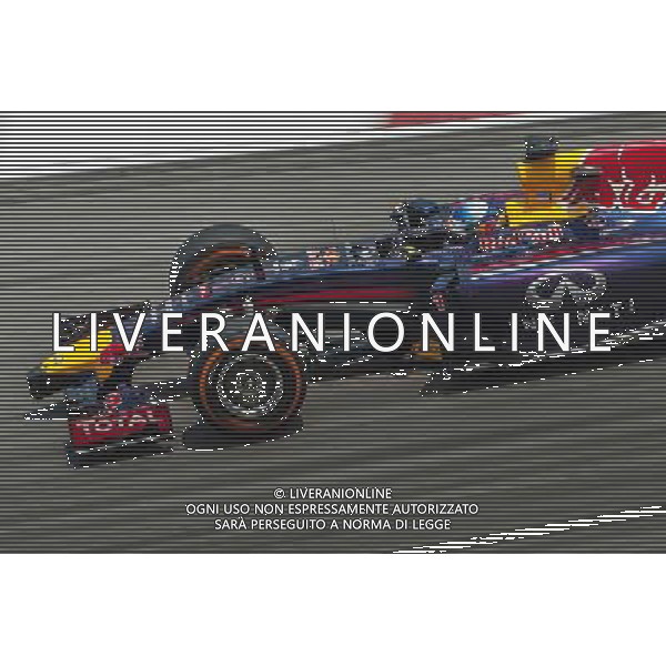 Sebastian Vettel (GER) Red Bull Racing RB10. 28.03.2014. Formula 1 World Championship, Rd 2, Malaysian Grand Prix, Sepang, Malaysia, Friday. - www.xpbimages.com, EMail: requests@xpbimages.com - copy of publication required for printed pictures. Every used picture is fee-liable. © Copyright: Moy / XPB Images AG ALDO LIVERANI SAS ONLY ITALY