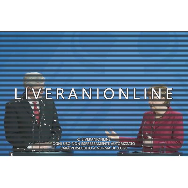 (140327) -- BERLIN, March 27, 2014 () -- German Chancellor Angela Merkel (R) and visiting Canada\'s Prime Minister Stephen Harper attend a press conference in Berlin, Germany, on March 27, 2014. (/Zhang Fan) AG ALDO LIVERANI SAS ONLY ITALY