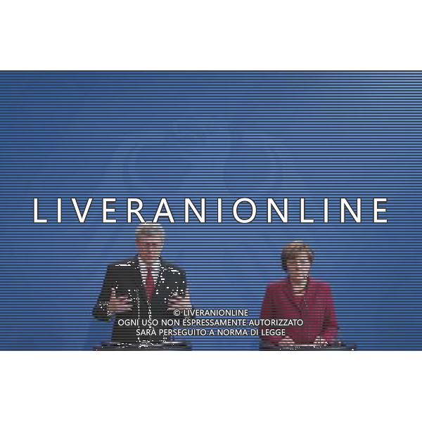 (140327) -- BERLIN, March 27, 2014 () -- German Chancellor Angela Merkel (R) and visiting Canada\'s Prime Minister Stephen Harper attend a press conference in Berlin, Germany, on March 27, 2014. (/Zhang Fan) AG ALDO LIVERANI SAS ONLY ITALY