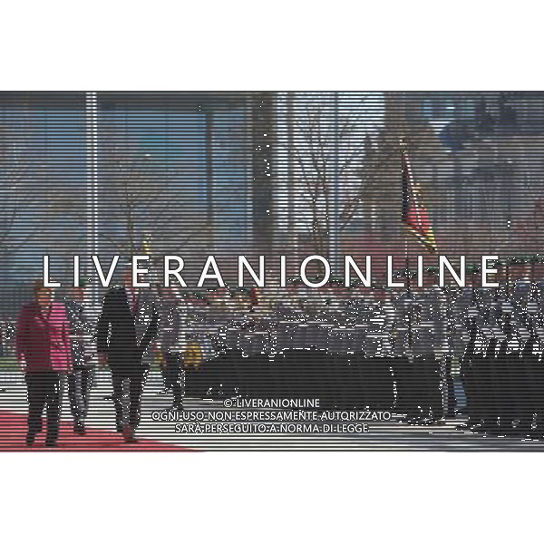 (140327) -- BERLIN, March 27, 2014 () -- German Chancellor Angela Merkel (L front) and visiting Canada\'s Prime Minister Stephen Harper (R front) inspect the honor guards during the welcoming ceremony in Berlin, Germany, on Mar. 27, 2014. (/Zhang Fan) AG ALDO LIVERANI SAS ONLY ITALY