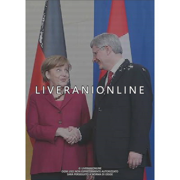 (140327) -- BERLIN, March 27, 2014 () -- German Chancellor Angela Merkel (L) and visiting Canada\'s Prime Minister Stephen Harper attend a press conference in Berlin, Germany, on March 27, 2014. (/Zhang Fan) AG ALDO LIVERANI SAS ONLY ITALY