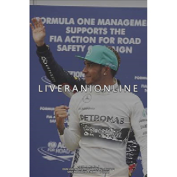 Lewis Hamilton (GBR) Mercedes AMG F1 celebrates his pole position in parc ferme. 29.03.2014. Formula 1 World Championship, Rd 2, Malaysian Grand Prix, Sepang, Malaysia, Saturday. - www.xpbimages.com, EMail: requests@xpbimages.com - copy of publication required for printed pictures. Every used picture is fee-liable. © Copyright: Price / XPB Images AG ALDO LIVERANI SAS ONLY ITALY