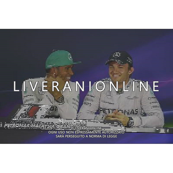 The post qualifying FIA Press Conference (L to R): Lewis Hamilton (GBR) Mercedes AMG F1, pole position; Nico Rosberg (GER) Mercedes AMG F1, third. 29.03.2014. Formula 1 World Championship, Rd 2, Malaysian Grand Prix, Sepang, Malaysia, Saturday. - www.xpbimages.com, EMail: requests@xpbimages.com - copy of publication required for printed pictures. Every used picture is fee-liable. © Copyright: Price / XPB Images AG ALDO LIVERANI SAS ONLY ITALY