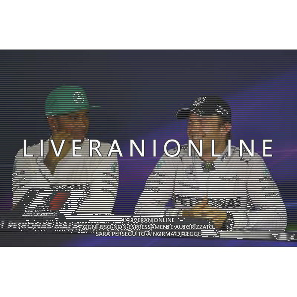 The post qualifying FIA Press Conference (L to R): Lewis Hamilton (GBR) Mercedes AMG F1, pole position; Nico Rosberg (GER) Mercedes AMG F1, third. 29.03.2014. Formula 1 World Championship, Rd 2, Malaysian Grand Prix, Sepang, Malaysia, Saturday. - www.xpbimages.com, EMail: requests@xpbimages.com - copy of publication required for printed pictures. Every used picture is fee-liable. © Copyright: Price / XPB Images AG ALDO LIVERANI SAS ONLY ITALY