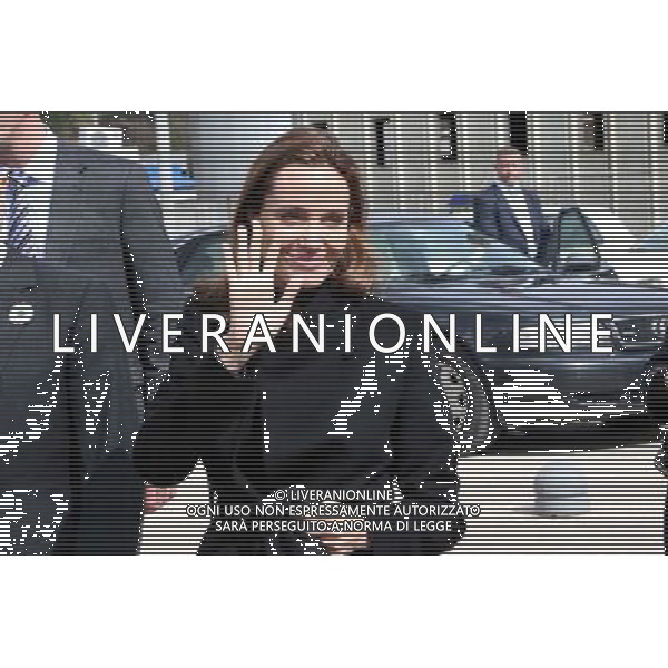(140328) -- SARAJEVO, March 28, 2014 () -- Hollywood star Angelina Jolie waves as she arrives at Srebrenica, Bosnia and Herzegovina (BiH), on March 28, 2014. The international conference on prevention of sexual violence in conflicts opened here on Friday, organized by Ministry of Defense of BiH. Hollywood star Angelina Jolie and British Foreign Secretary William Hague were among participants in the regional conference which was also joined by high officials from BiH government and international organizations. (/Haris Memija) AG ALDO LIVERANI SAS ONLY ITALY