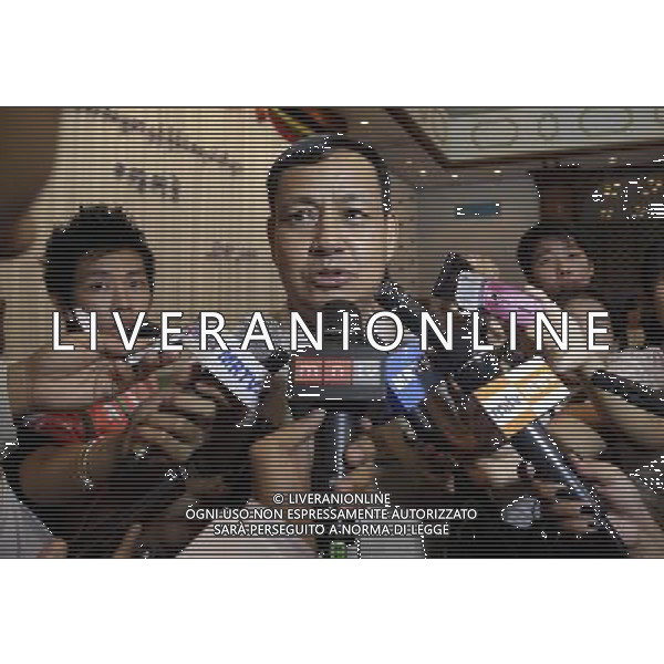 (140329) -- YANGON, March 29, 2014 () -- U Ye Htut (C), Presidential Spokesman and Myanmar Deputy Minister of Information, speaks to the media between the meetings of President and 63 political parties at Yangon Region Parliament building in Yangon, Myanmar, March 29, 2014. Myanmar\'s president U Thein Sein on Saturday urged political parties to cooperate in promoting peace process of the country during the meeting with 63 of all 65 registered political parties. (/U Aung)(zhf) ©photoshot/AGENZIA ALDO LIVERANI SAS - ITALY ONLY - EDITORIAL USE ONLY - Riunione dei 63 partiti politici a palazzo Yangon Regione del Parlamento a Yangon, Myanmar , 29 marzo 2014.
