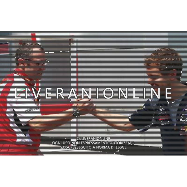 (L to R): Stefano Domenicali (ITA) Ferrari General Director with Sebastian Vettel (GER) Red Bull Racing. 30.03.2014. Formula 1 World Championship, Rd 2, Malaysian Grand Prix, Sepang, Malaysia, Sunday. - www.xpbimages.com, EMail: requests@xpbimages.com - copy of publication required for printed pictures. Every used picture is fee-liable. © Copyright: Batchelor / XPB Images AG ALDO LIVERANI SAS ONLY ITALY